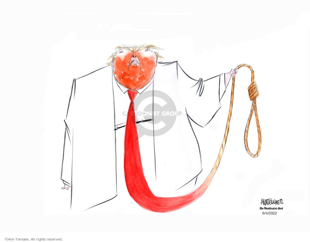 No caption (Donald Trump holds the end of his red tie, which is fashioned in the form of a noose).
